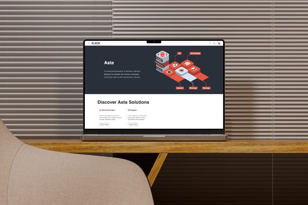 A laptop showing the Elecosoft Asta page, with modules for scheduling, 4D, updates, management and storage