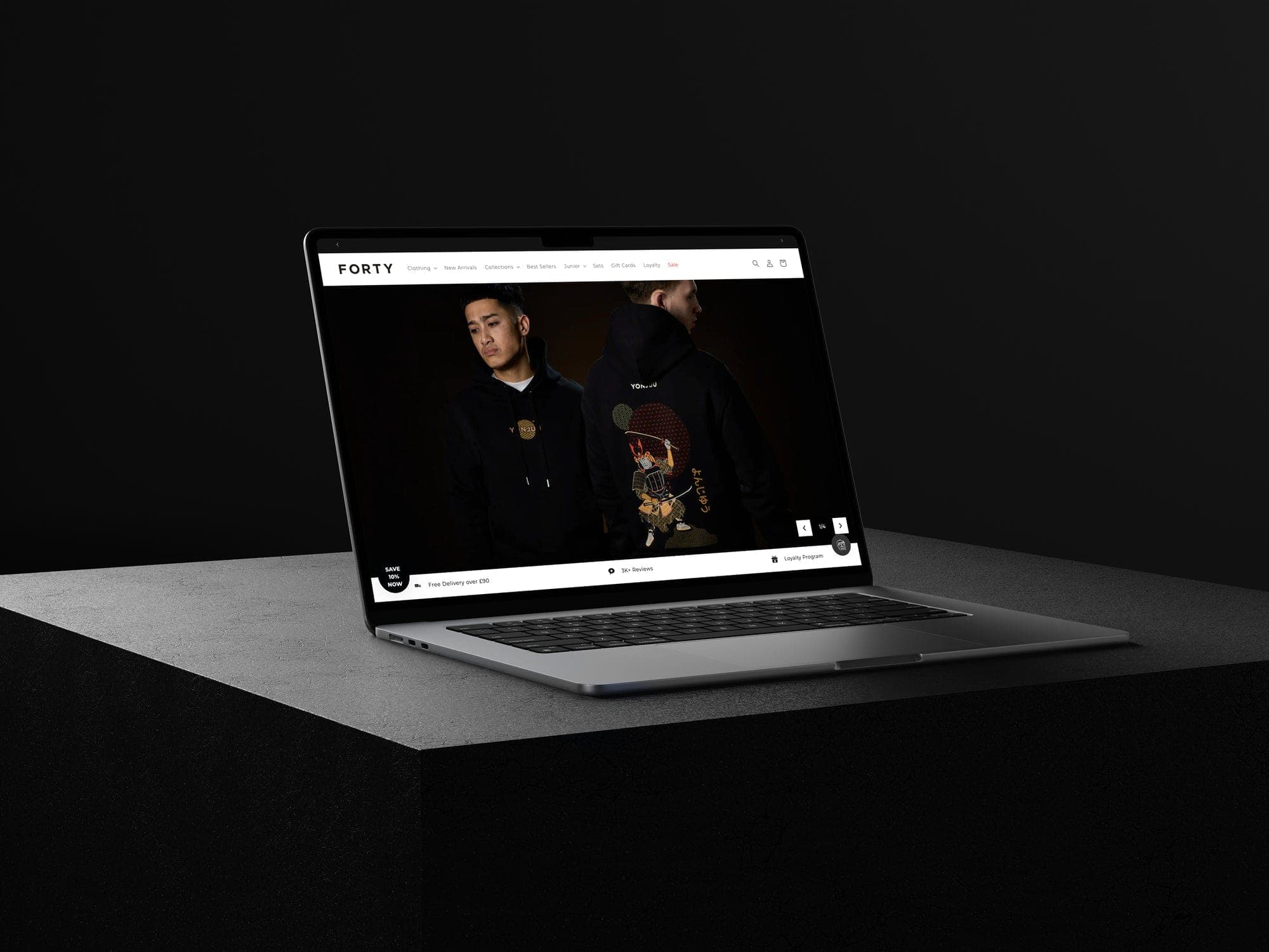 Forty Clothing Shopify storefront on a laptop mockup